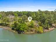 119 Waters Edge Drive, Hampstead, NC 28443 — 4-bedroom waterfront home in Deerfield, Hampstead, NC, photo 9 of 28: 002_119_waters_edge_drive-2_724