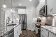 2267 Reefside Loop NE, Leland, NC 28451 — 3-bedroom home in Compass Pointe, Leland, NC, photo 11 of 71: kitchen