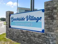 227 Sandy Cove Lane, Sneads Ferry, NC 28460 — 3-bedroom townhome in Beachside Commons, Sneads Ferry, NC, photo 22 of 30: Neighborhood Sign