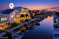 23 Scotland Street, Ocean Isle Beach, NC 28469 — 5-bedroom waterfront home, Ocean Isle Beach, NC, photo 1 of 47