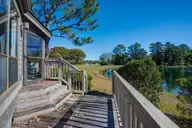 7503 Windward Drive, New Bern, NC 28560 — 3-bedroom waterfront condo in Fairfield Harbour, New Bern, NC, photo 23 of 33: Deck on Lake