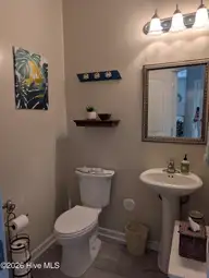 114 Lumis Court, Hampstead, NC 28443 — 4-bedroom home in Dogwood Lakes, Hampstead, NC, photo 5 of 26: Half bath with closet