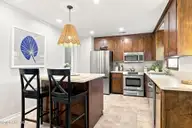 211 Vine Street, Beaufort, NC 28516 — 3-bedroom home in Jones Village, Beaufort, NC, photo 19 of 36: Kitchen and Island
