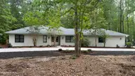 20 Sunfield Drive, Calabash, NC 28467 — 4-bedroom home in Carolina Shores, Calabash, NC, photo 1 of 61: Front Elevation