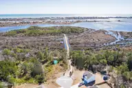 608 201 Needlerush Court, Sneads Ferry, NC 28460 — waterfront lot in The Preserve at Tidewater, Sneads Ferry, NC, photo 1 of 13: 9-min