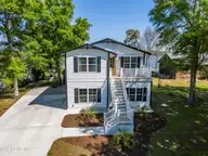 725 Chadwick Shores Drive, Sneads Ferry, NC 28460 — 3-bedroom waterfront home in Chadwick Shores, Sneads Ferry, NC, photo 2 of 66: DJI_20260415105213_0084_D