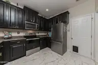 101 Boysenberry Fields Road, Maple Hill, NC 28454 — 3-bedroom home in Strawberry Fields, Maple Hill, NC, photo 20 of 43: 20KITCHEN