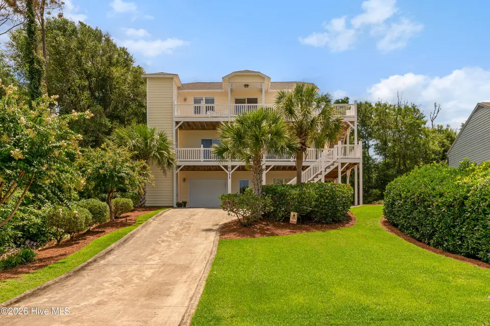 6611 Marsh Cove Road, Emerald Isle, NC 28594 — 3-bedroom waterfront home in Marsh Cove, Emerald Isle, NC, photo 1 of 52: Stunning soundside Emerald Isle home