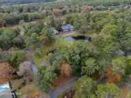 187 69 Clubhouse Drive SW, Supply, NC 28462 — waterfront lot in Lockwood Folly, Supply, NC, photo 4 of 27: DJI_0074