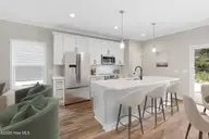 232 Cline Way 129, Beaufort, NC 28516 — 3-bedroom townhome in 1809 Live Oak, Beaufort, NC, photo 2 of 42: Eat-In Kitchen with Island