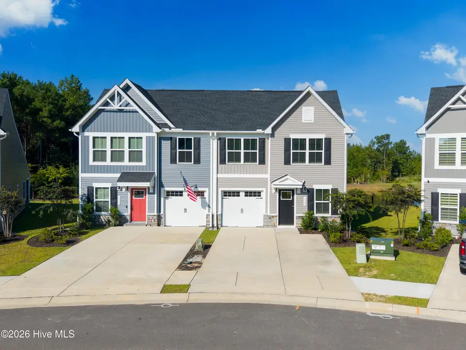1523 Pine Log Trail NE, Bolivia, NC 28422 — 3-bedroom waterfront townhome in Middle Creek Village, Bolivia, NC, photo 1 of 47