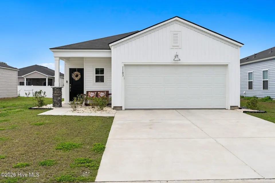 1103 Pink Snapper Place NW, Sunset Beach, NC 28468 — 3-bedroom home in Sunfish Cove, Sunset Beach, NC, photo 1 of 33: 3-web-or-mls-cammediallc.com-26