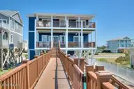 5103 W Beach Drive, Oak Island, NC 28465 — 4-bedroom waterfront home in W. Long Beach, Oak Island, NC, photo 5 of 65: 5103 W Beach Drive 4