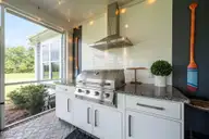 222 Twining Rose Lane, Holly Ridge, NC 28445 — 4-bedroom waterfront home in Summerhouse On Everett Bay, Holly Ridge, NC, photo 21 of 62: Outdoor Kitchen