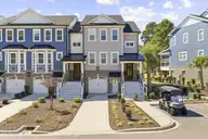 620 Eastwood Park Road Unit 6a, Sunset Beach, NC 28468 — 4-bedroom townhome in Sea Trail Plantation, Sunset Beach, NC, photo 1 of 73: 60-web-or-mls-DJI_20260929115449_0926_D