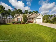 423 Blue Pennant Court, Sneads Ferry, NC 28460 — 3-bedroom home in Oyster Landing, Sneads Ferry, NC, photo 9 of 35: Front