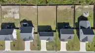 566 Transom Way, Sneads Ferry, NC 28460 — 3-bedroom home in Oyster Landing, Sneads Ferry, NC, photo 4 of 60: 43_drone