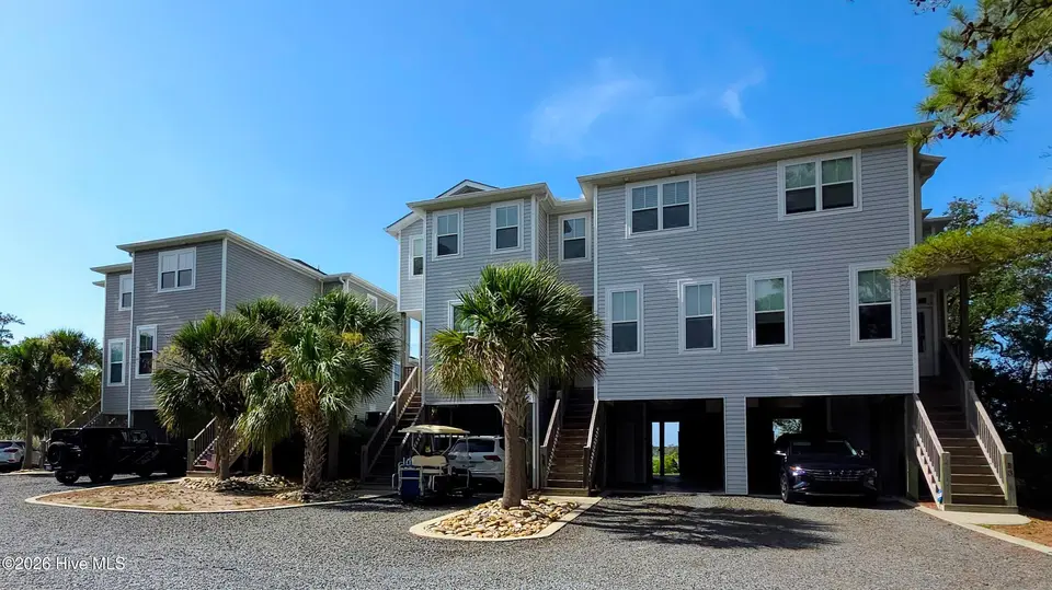 7000 E Yacht Drive B2, Oak Island, NC 28465 — 3-bedroom waterfront townhome in Tranquil Harbor, Oak Island, NC, photo 1 of 28