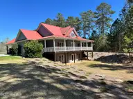 104 Bridle Path Lane, Carthage, NC 28327 — 3-bedroom waterfront home in Carolina Equest, Carthage, NC, photo 4 of 64: Farm House