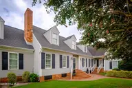 1008 Bateman Drive, Elizabeth City, NC 27909 — 4-bedroom waterfront home in Bateman Estates, Elizabeth City, NC, photo 2 of 74: Front of House