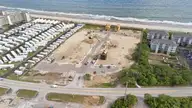 105 Ocean Promenade, Indian Beach, NC 28512 — 5-bedroom waterfront home in The Pearls Oceanside, Indian Beach, NC, photo 17 of 17: 15-print-DJI_20260505165432_0899_D