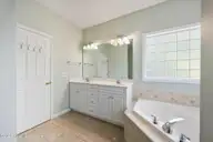1235 Burning Tree Road 12, Pinehurst, NC 28374 — 3-bedroom home in Unit 12, Pinehurst, NC, photo 11 of 24: Master Bath