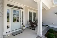 145 W Keel Drive, Hampstead, NC 28443 — 3-bedroom home in Salters Haven at Lea Marina, Hampstead, NC, photo 4 of 57: front porch