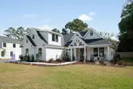 385 Crow Creek Drive NW, Calabash, NC 28467 — 4-bedroom home in Crow Creek, Calabash, NC, photo 3 of 41: CDWK_2211_EXT_01