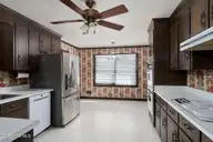 913 Robert E Lee Drive, Wilmington, NC 28412 — 4-bedroom home in Pine Valley Estates, Wilmington, NC, photo 9 of 35: kitchen-01c