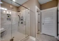 67 Lilaput Circle, Wilmington, NC 28411 — 3-bedroom home in Indigo at Abbey Preserve, Wilmington, NC, photo 13 of 27: Primary Bathroom