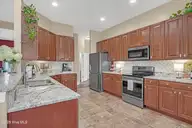 1226 Atrium Way, Leland, NC 28451 — 3-bedroom waterfront home in Waterford of the Carolinas, Leland, NC, photo 5 of 61: Kitchen