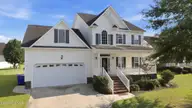 1129 Bryson Drive, Greenville, NC 27834 — 3-bedroom home in Taberna, Greenville, NC, photo 1 of 49: 1-web-or-mls-DJI_20260902163809_0692_D