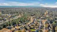 159 Emerald Ridge Drive, Hampstead, NC 28443 — 3-bedroom home in Emerald Ridge, Hampstead, NC, photo 24 of 39: 159EmeraldRidgeDriveDrone-6