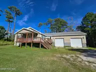 263 Nelson Neck Road, Sea Level, NC 28577 — 2-bedroom home in Sea Level Inn, Sea Level, NC, photo 1 of 17: Front