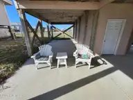2005 N Shore Drive, Surf City, NC 28445 — 3-bedroom waterfront home in Old Settlers Beach, Surf City, NC, photo 2 of 27: 2005 N Shore Dr (By The Sea [Int Refresh
