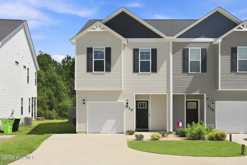 510 Shallotte Lane, Holly Ridge, NC 28445 — 3-bedroom townhome in The Landing At Folkstone, Holly Ridge, NC, photo 1 of 57