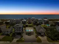 5221 E Pelican Drive, Oak Island, NC 28465 — 2-bedroom waterfront home, Oak Island, NC, photo 1 of 52