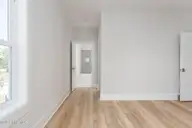 114 Seagate Place, Wilmington, NC 28403 — 5-bedroom townhome in Seagate, Wilmington, NC, photo 14 of 52: great-room-01b