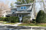 2029 Eastwood Road Apt 127, Wilmington, NC 28403 — 2-bedroom waterfront townhome in Wrightsville West Townhomes, Wilmington, NC, photo 1 of 62: Eastwood2029-127-1FLFL33A7130 copy