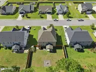 212 Independence Boulevard, Newport, NC 28570 — 4-bedroom home in Heritage Pointe, Newport, NC, photo 4 of 28: aerial back