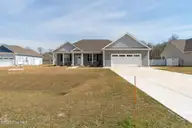 610 Bright Harvest Drive, Maysville, NC 28555 — 3-bedroom home in Batchelors Cove, Maysville, NC, photo 2 of 33: Front from street