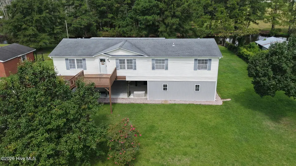 272 Bay Shore Drive, Chocowinity, NC 27817 — 3-bedroom waterfront manufactured home in Pleasant Waters, Chocowinity, NC, photo 1 of 67: 63-web-or-mls-Drone 272 Bay Shore Drive-