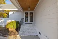 1600 Chip Shot Drive, Morehead City, NC 28557 — 3-bedroom home in Country Club East, Morehead City, NC, photo 6 of 57: front entrance
