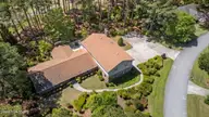 311 Lord Granville Drive, Morehead City, NC 28557 — 3-bedroom home in Brandywine Bay, Morehead City, NC, photo 1 of 53: Aerial