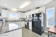 318 E Beach Drive, Oak Island, NC 28465 — 4-bedroom waterfront home, Oak Island, NC, photo 21 of 80