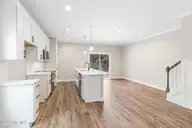 232 Cline Way 129, Beaufort, NC 28516 — 3-bedroom townhome in 1809 Live Oak, Beaufort, NC, photo 11 of 42: Kitchen- Open Concept to Dining & Living
