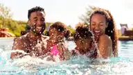 241 Maddox Drive, Aberdeen, NC 28315 — 3-bedroom townhome in Martin Farms, Aberdeen, NC, photo 10 of 25: African-American-Family-Laughing-and-Spl