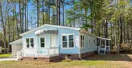 501 Deer Path, Calabash, NC 28467 — 2-bedroom home in Saltaire Village, Calabash, NC, photo 2 of 57: Front of Home