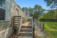 1426 Cherrytree Road NE, Winnabow, NC 28479 — 2-bedroom manufactured home in Deerfield Estates, Winnabow, NC, photo 4 of 25