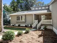 131 Oakleaf Drive, Pine Knoll Shores, NC 28512 — 3-bedroom waterfront home in Piksco, Pine Knoll Shores, NC, photo 2 of 35: Entrance